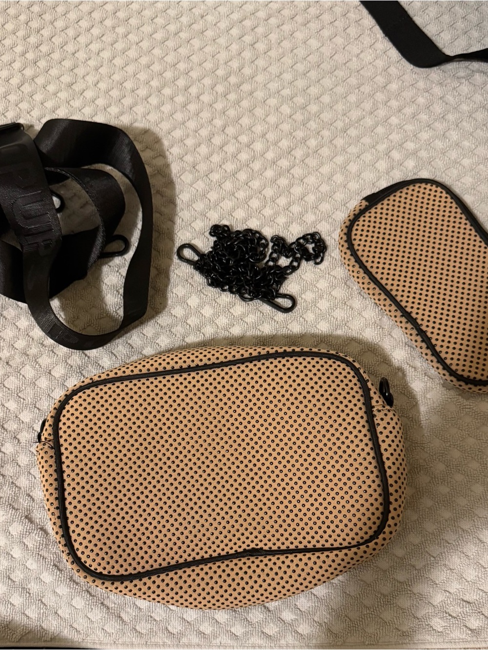 Tan Crossbody Bag with Black Trim and Perforated Texture
